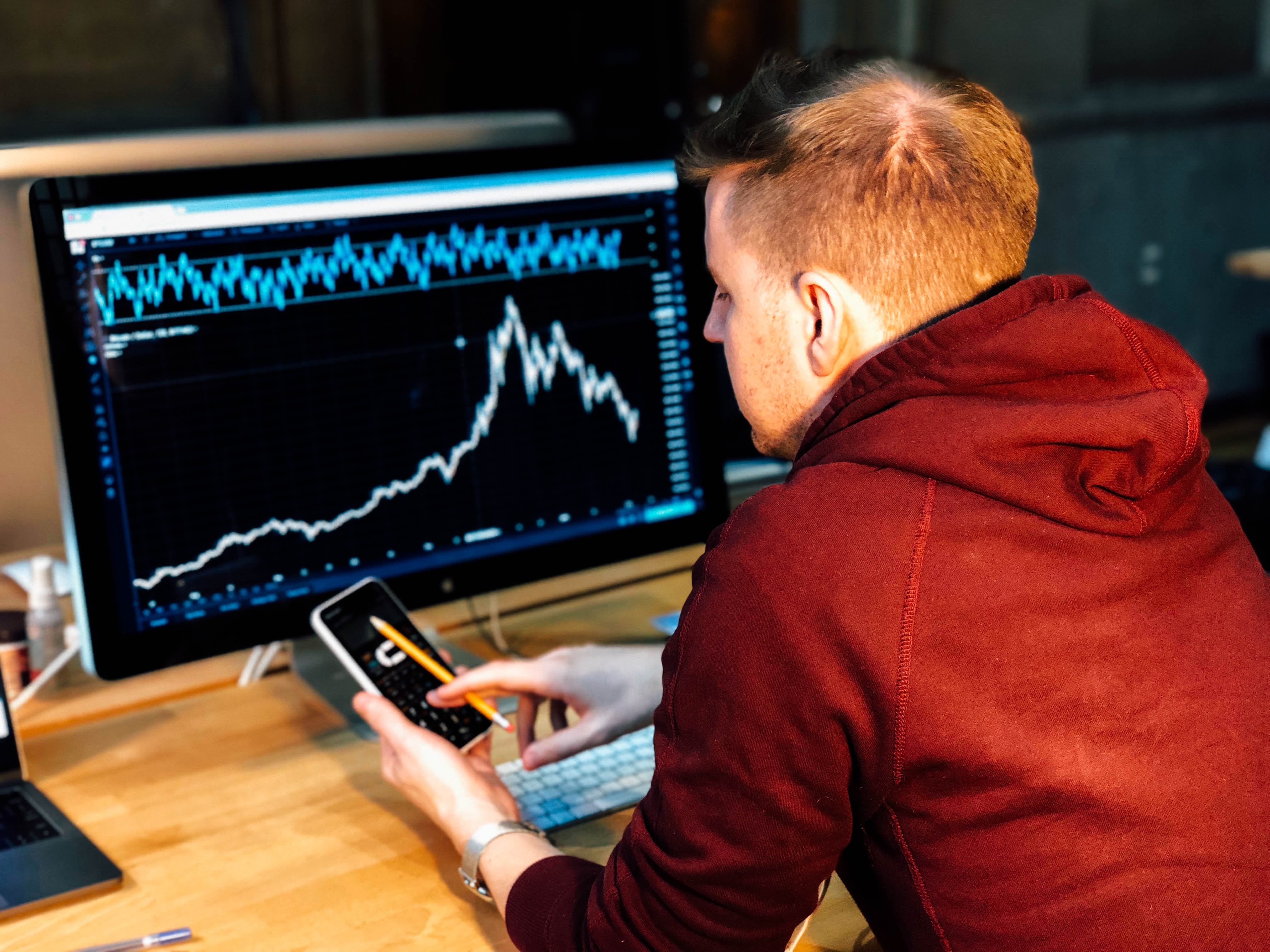 Student who is studying stock trends